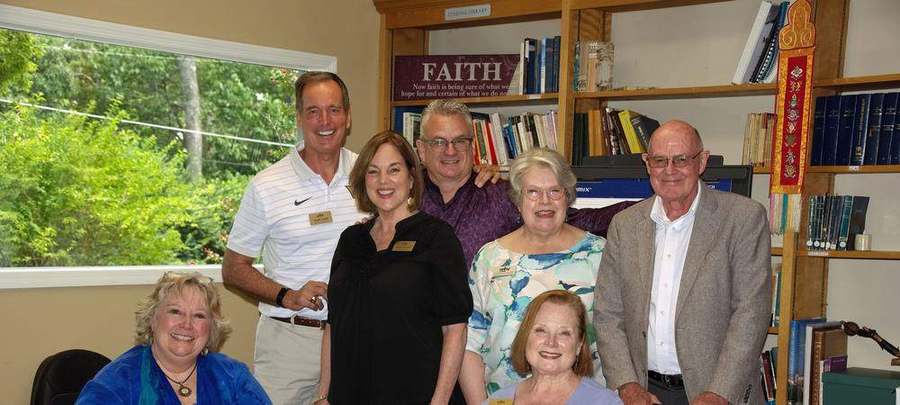 The Unity of Nashville Board of Trustees, gathered in the lending library